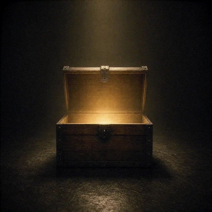 An open treasure chest in a beam of light